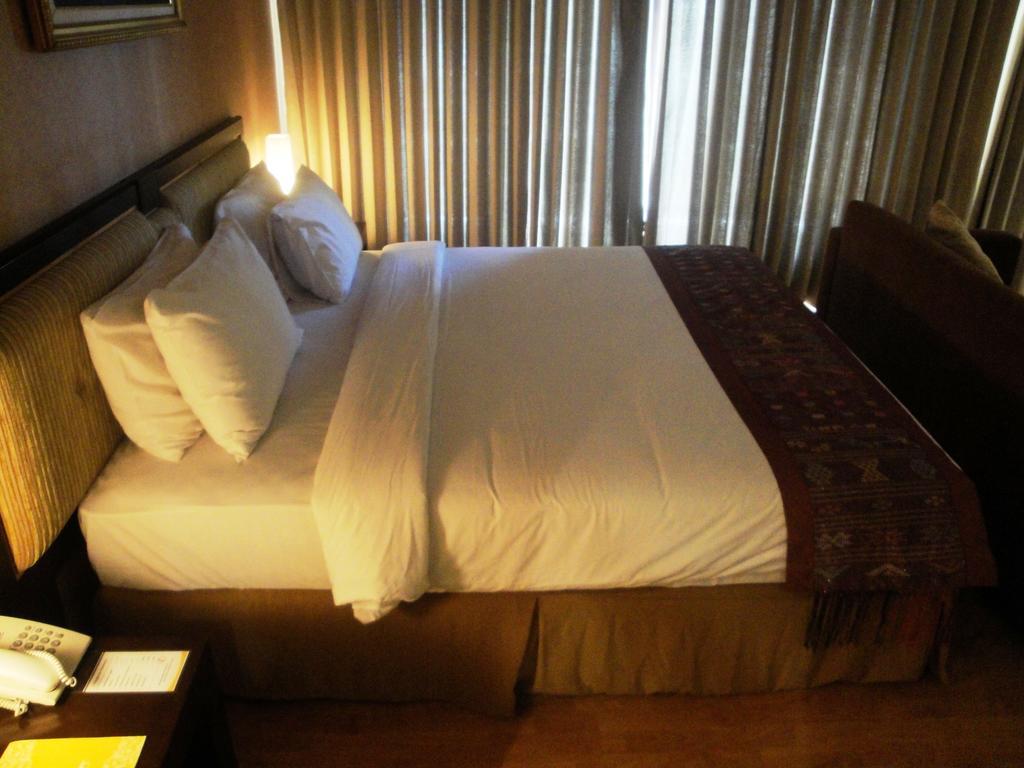 Sutanraja Hotel Manado Rom bilde